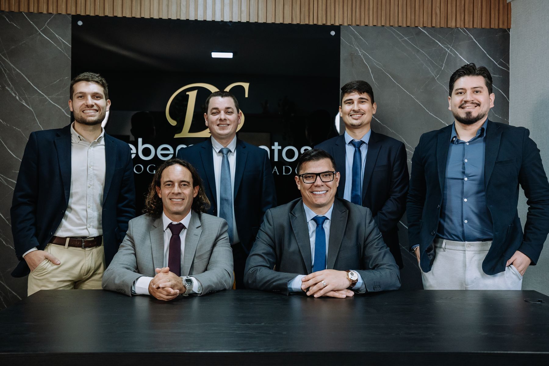 Sócios fundadores com a equipe de advogados